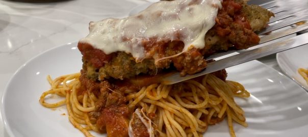 The juiciest Chicken Parmesan you have ever had is made by Health Held In Hand